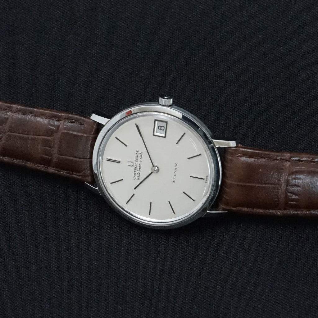 UNIVERSAL GENEVE White Shadow Date microtor automatic – CH Watch Service